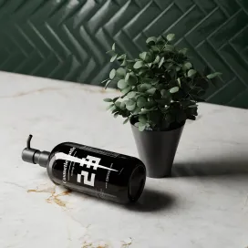 Black Pump Bottle Featuring an Eucalyptus Plant 01